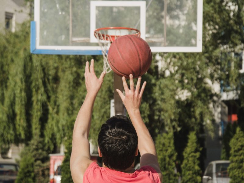 back-view-basketball-player-throwing